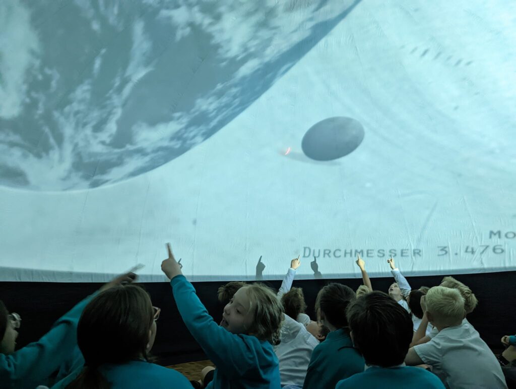 Photo showing Horsmonden pupils experiencing the Wonderdome during Innovation Week.