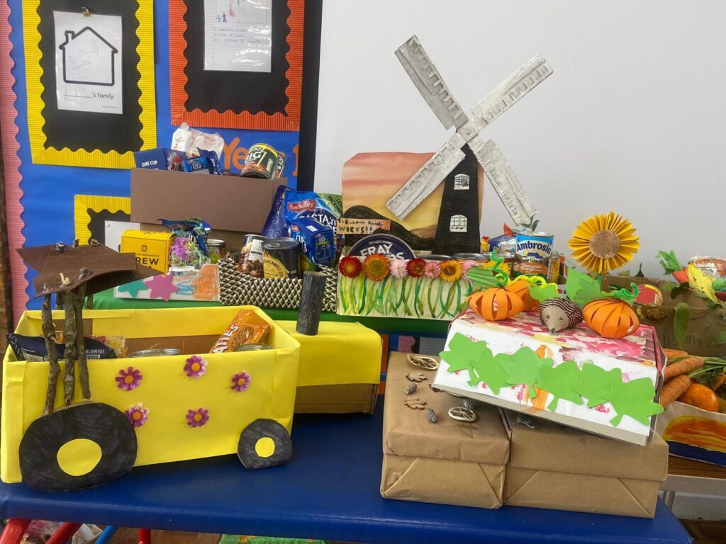 An image of multiple decorated harvest boxes on a table