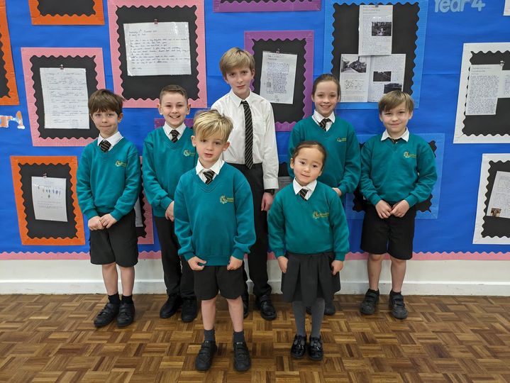 Photo showing winners of the Horsmonden Hero award smiling for the camera.
