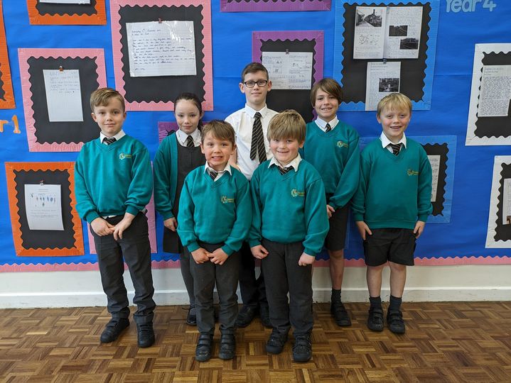 Photo showing winners of the Horsmonden Hero award smiling for the camera.